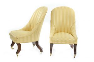 A Pair of Regency Upholstered Low Chairs