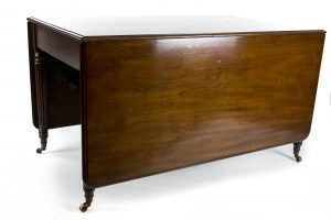 A Regency Mahogany Drop Leaf Dining Table in the Manner of Gillows