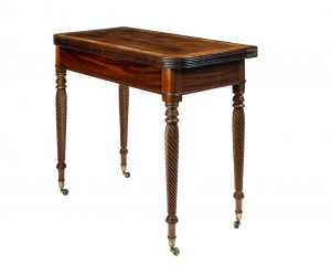 A Regency rosewood card table with inlaid top, satinwood banding with boxwood stringing. attributed to Gillows
