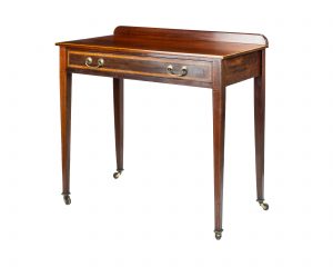 An Edwardian Writing or Side Table by Maple and Co.