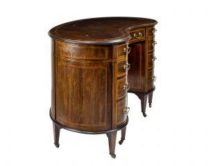 A fine Edwardian kidney shaped Desk attributed to Gillows