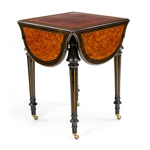 Victorian amboyna and ebonised card table in the style of Gillow